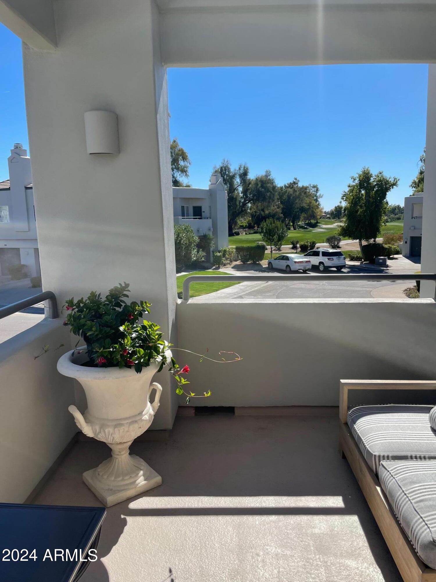 7710 East Gainey Ranch Road, Unit 214 Scottsdale, AZ 85258 - Photo 3 of 23 Front Patio