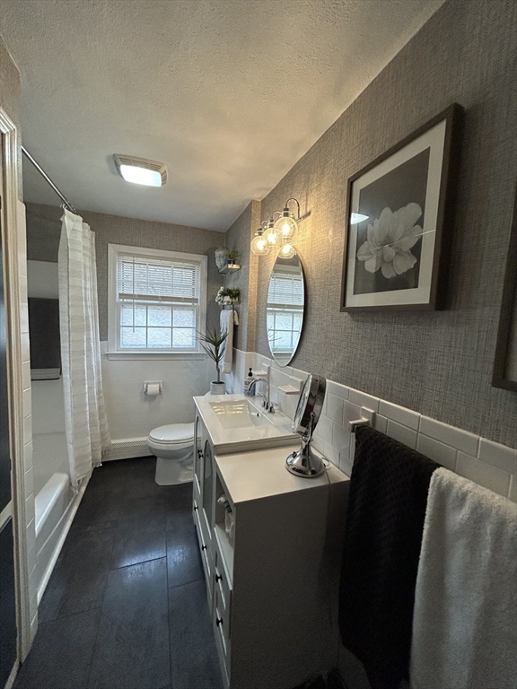 10 Walter Street Norton, MA 02766 - Photo 18 of 33 a view of dining room and wooden floor