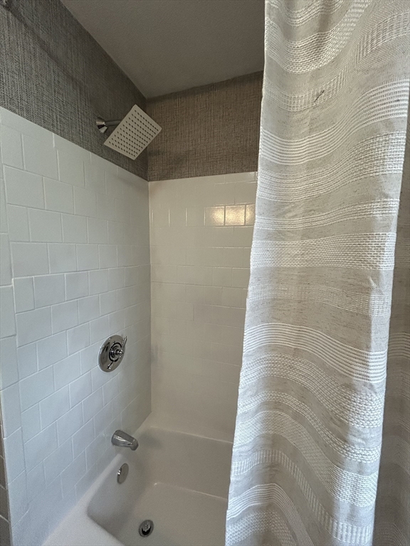 10 Walter Street Norton, MA 02766 - Photo 20 of 33 a bathroom with a shower and a sink