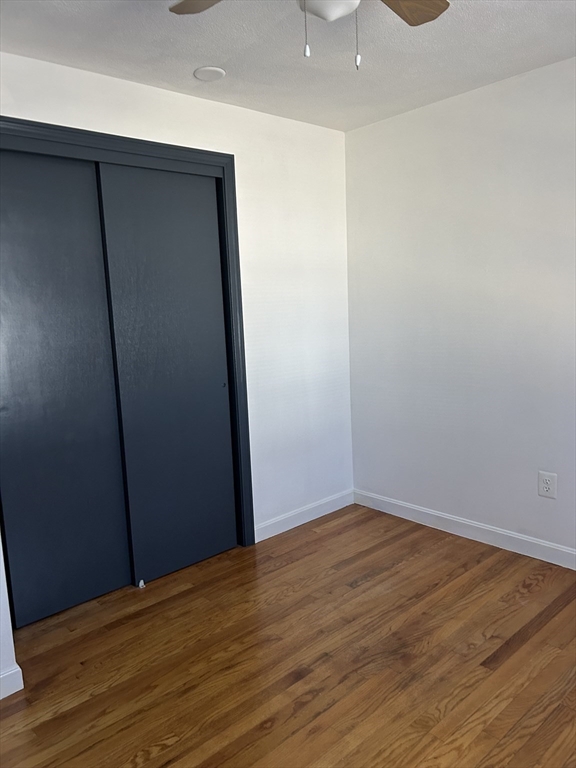 10 Walter Street Norton, MA 02766 - Photo 22 of 33 an empty room with wooden floor