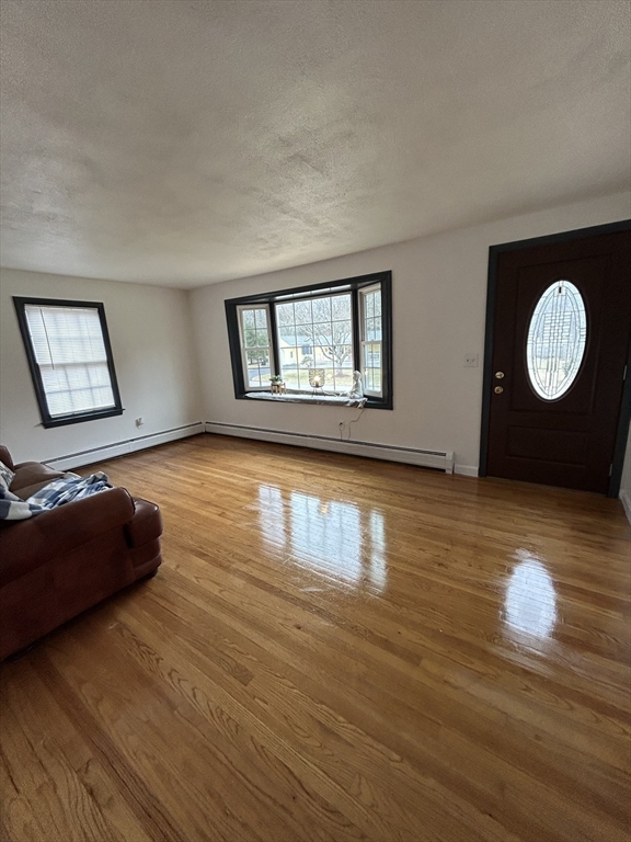 10 Walter Street Norton, MA 02766 - Photo 30 of 33 a living room with furniture and a large window