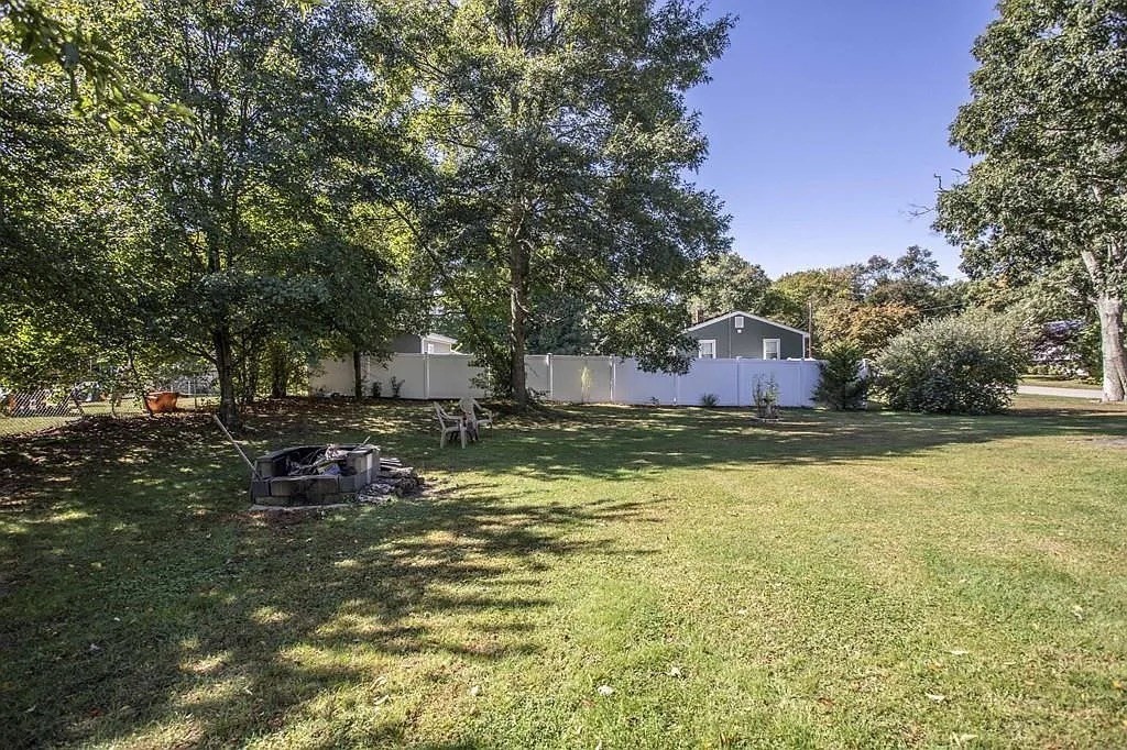 10 Walter Street Norton, MA 02766 - Photo 3 of 33 a swimming pool with outdoor seating and yard