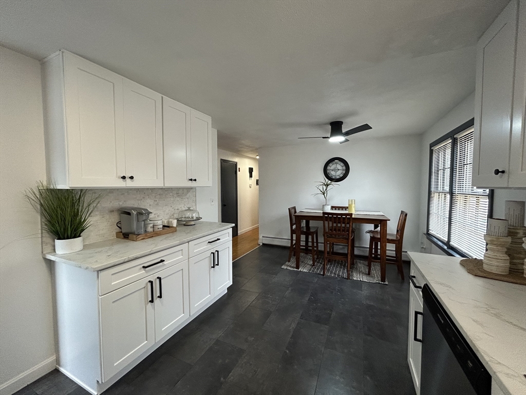 10 Walter Street Norton, MA 02766 - Photo 7 of 33 a living room with furniture a dining table and a piano