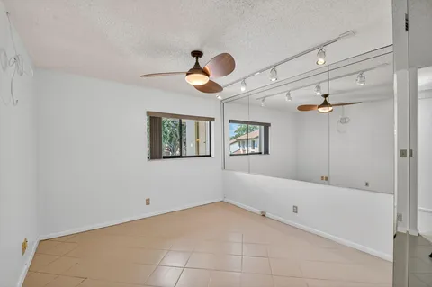 a view of a kitchen with electric appliances