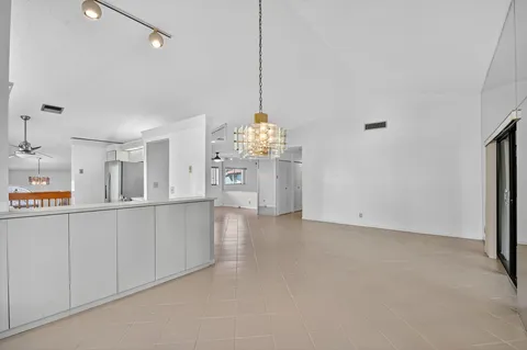 a kitchen with a sink stove and microwave