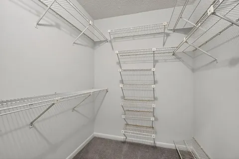 a view of a lake with a yard