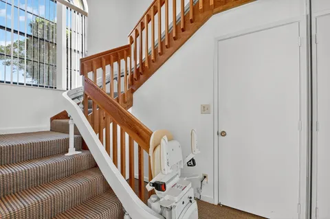 a bathroom with a toilet a sink and a shower