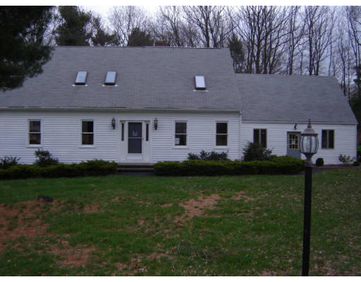 6 Callery Lane Canton, MA 02021 - Photo 1 of 1 a front view of a house with garden