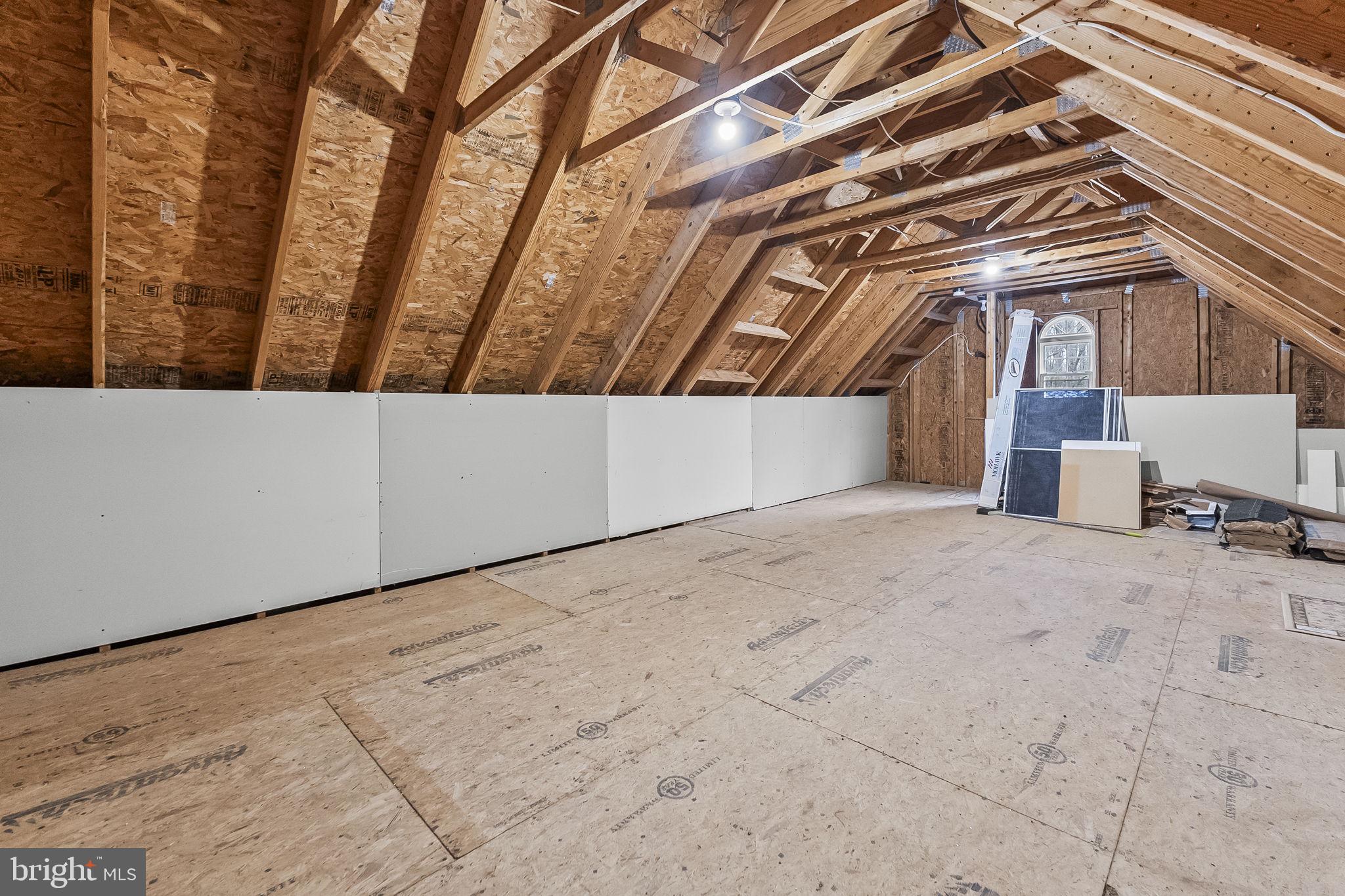 9290 Gunston Road Welcome, MD 20693 - Photo 37 of 63 Floored Attic area above garage for extra storage