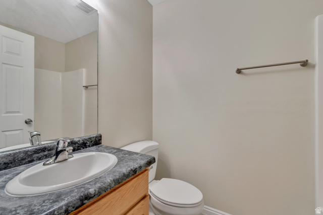 1118 North Ridge Court Spanish Fork, UT 84660 - Photo 16 of 32 Bathroom featuring vanity and toilet