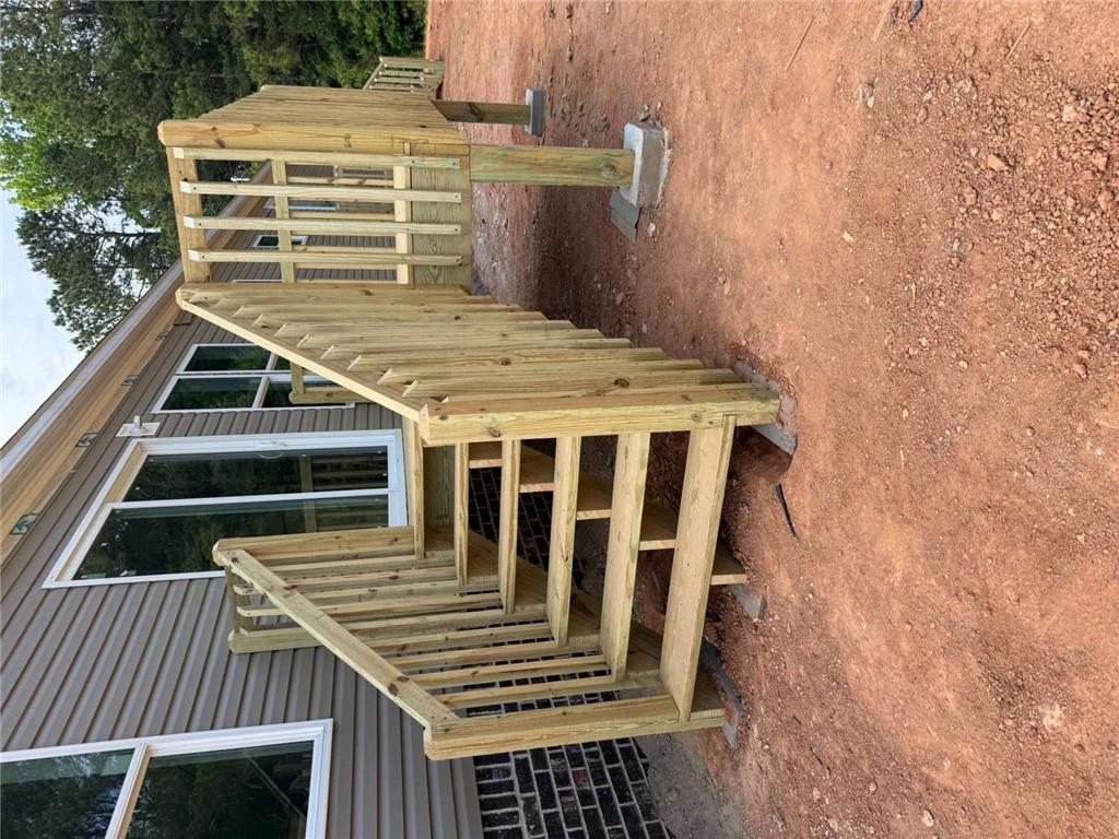 1052 Jones Ferry Road Elberton, GA 30635 - Photo 15 of 16 a view of entryway with wooden stairs