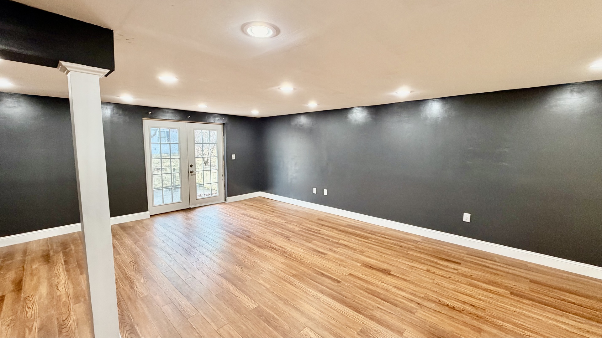 16846 East Payton Road Opdyke, IL 62872 - Photo 16 of 23 a view of an empty room with wooden floor and a window