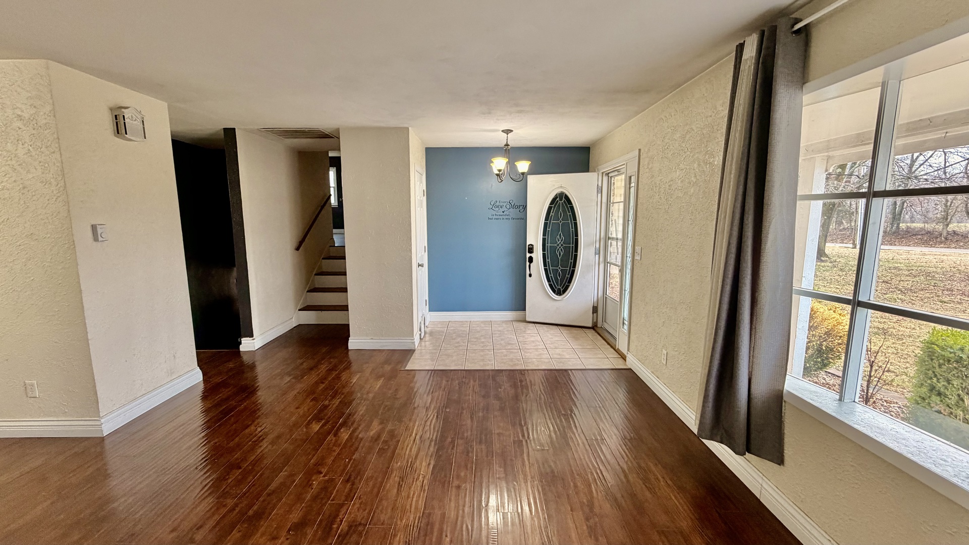 16846 East Payton Road Opdyke, IL 62872 - Photo 7 of 23 a view of a hallway with wooden floor and door