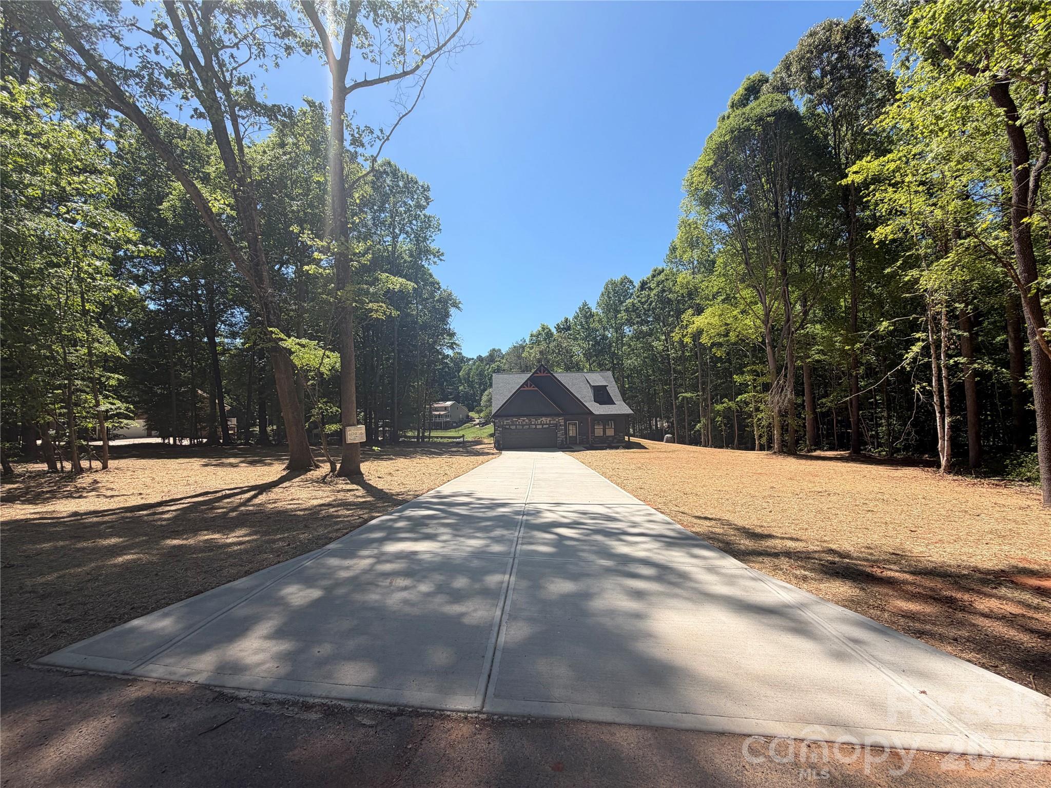 320 Blue Heron Road Salisbury, NC 28146 - Photo 2 of 22 a view of a backyard of a house