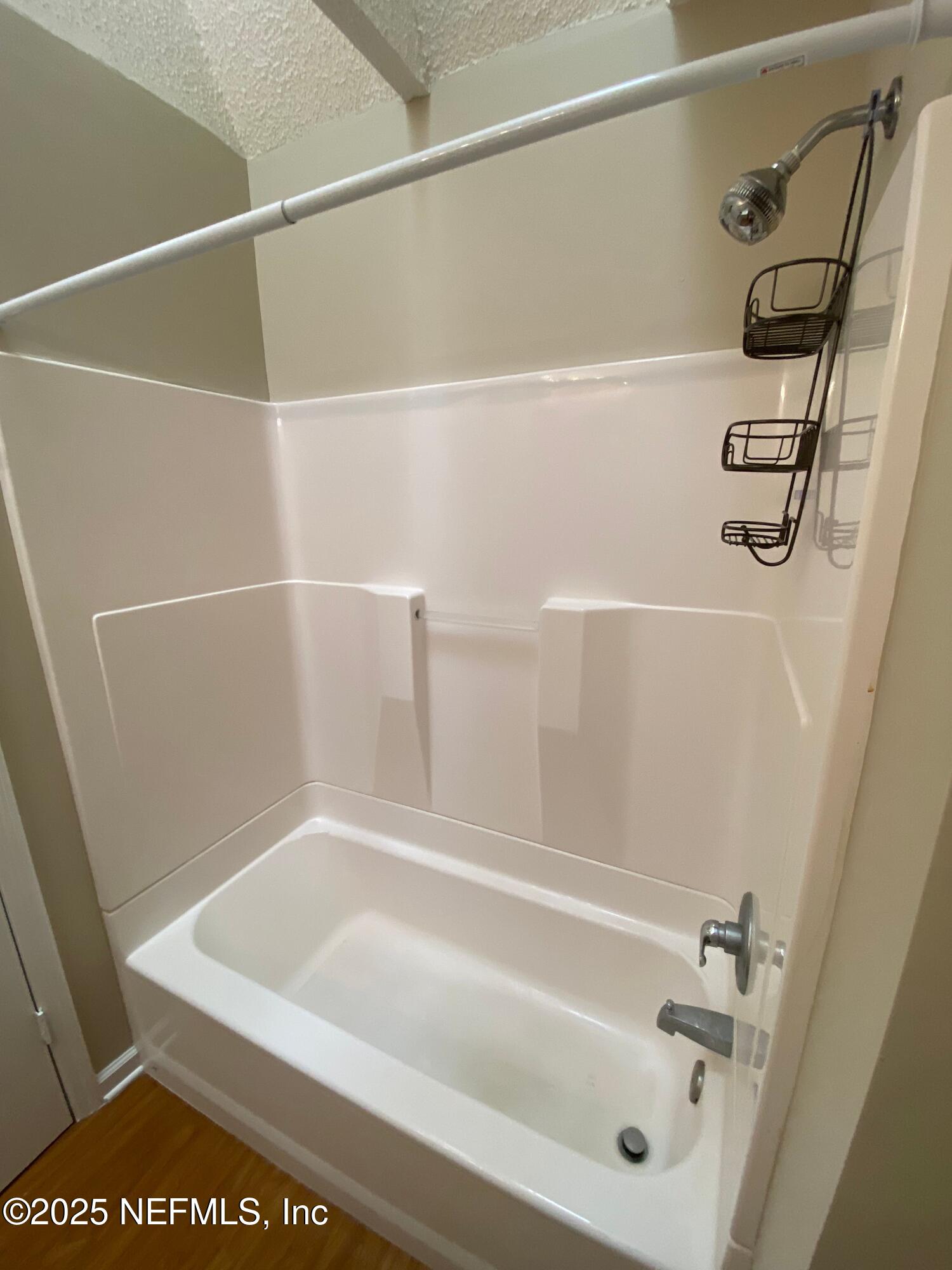 4129 Quiet Creek Loop Middleburg, FL 32068 - Photo 12 of 24 a bathroom with a bath tub