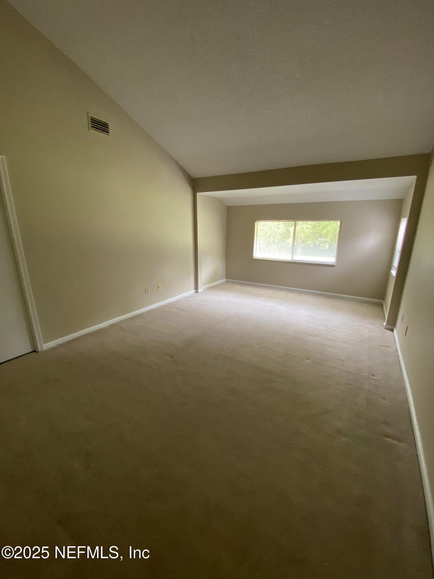 4129 Quiet Creek Loop Middleburg, FL 32068 - Photo 13 of 24 an empty room with a window