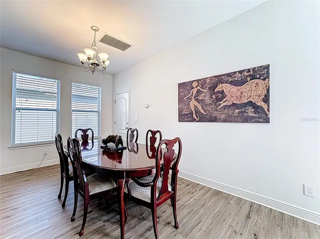 a bedroom with a bed and a desk