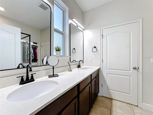 a bedroom with a workspace