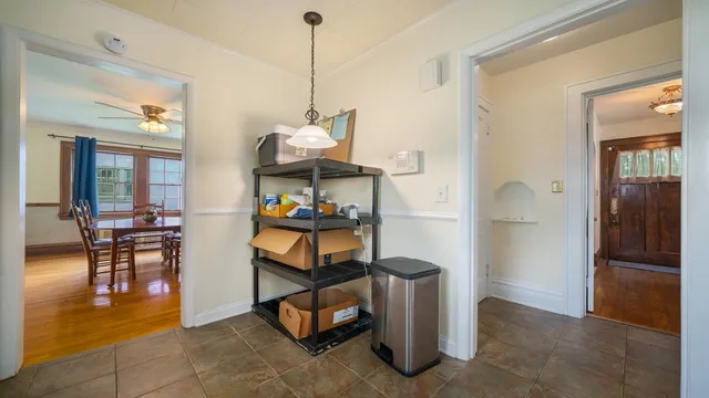 a bed room with a bed and a lamp