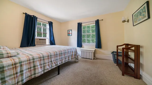 a view of a room with wooden walls