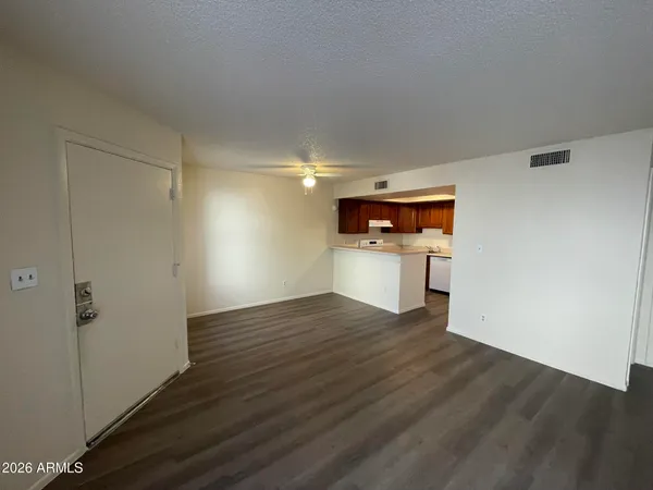 a view of a kitchen with a wooden floor