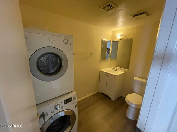 a bathroom with a sink and toilet