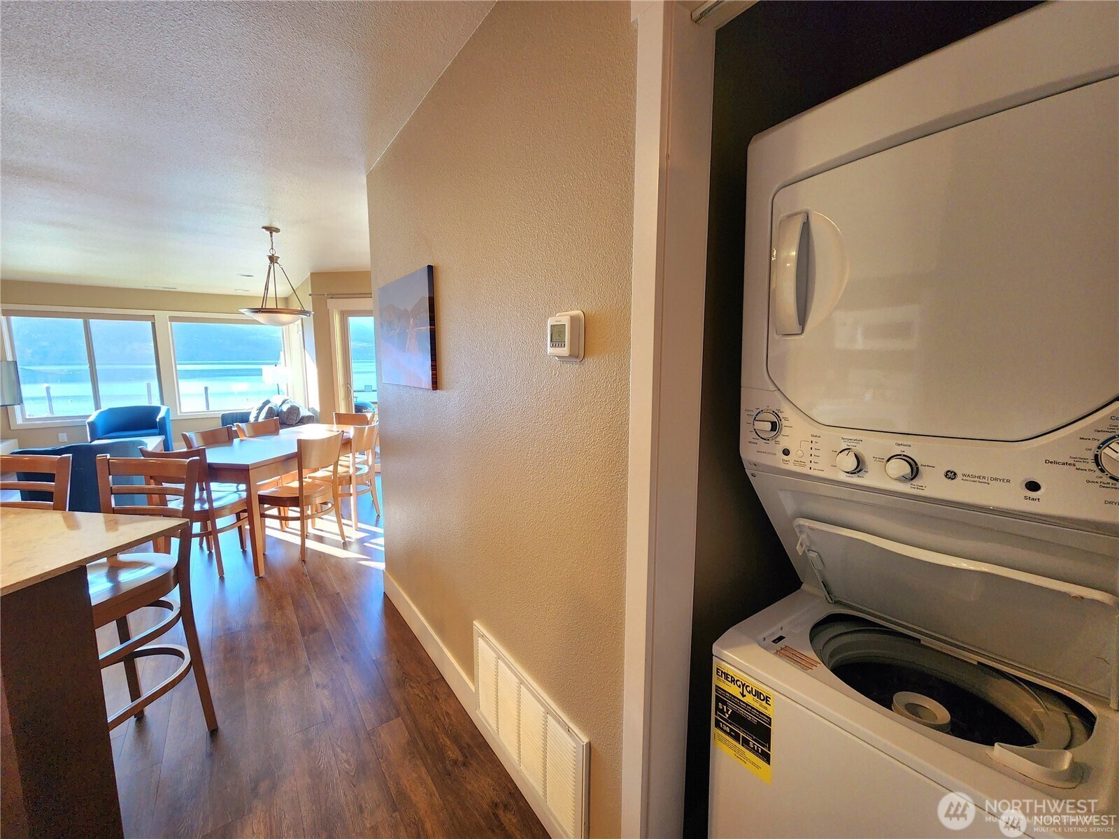 1 Lakeside 708-l Manson, WA 98831 - Photo 14 of 36 a living room with furniture and wooden floor