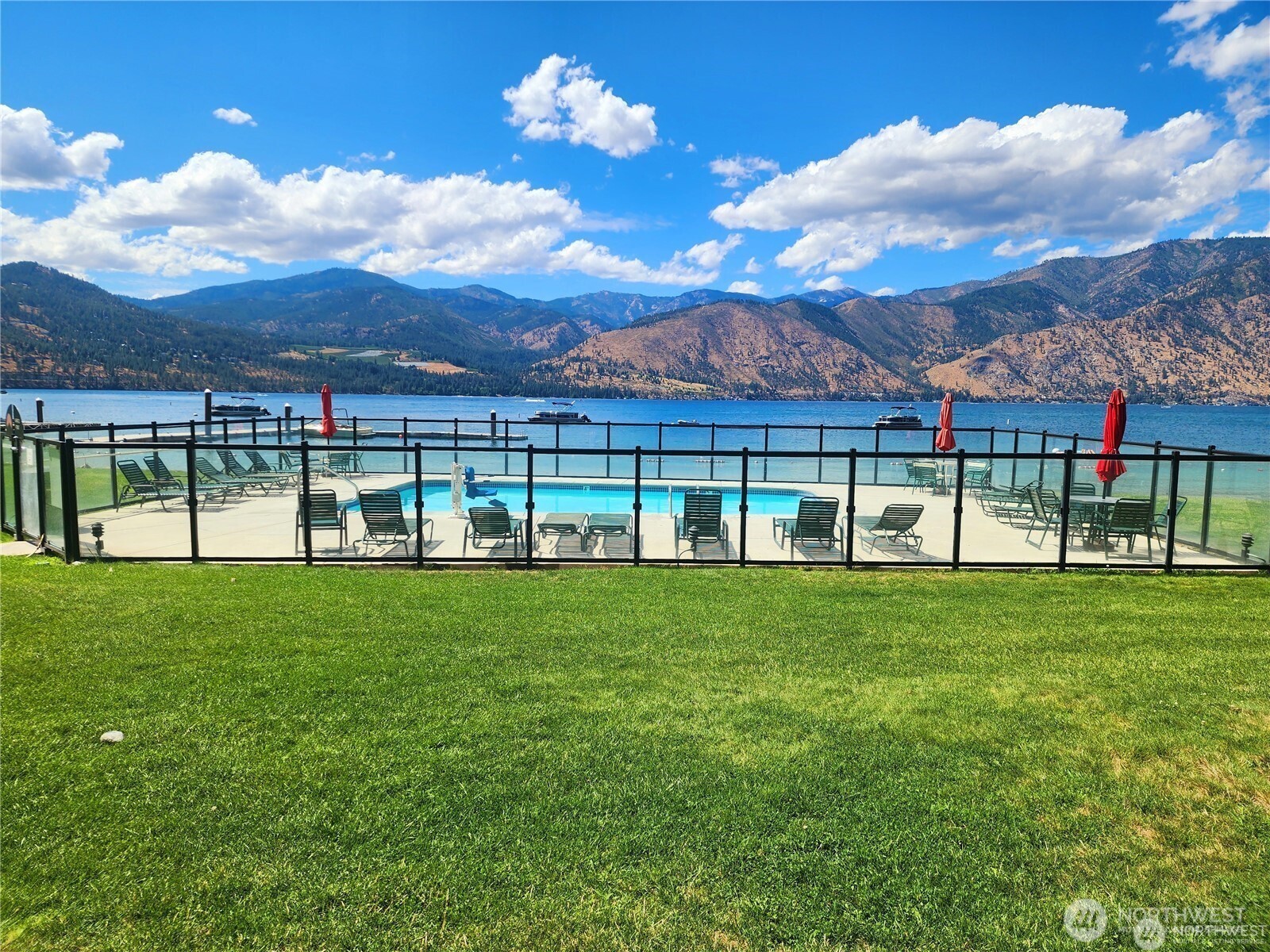 1 Lakeside 708-l Manson, WA 98831 - Photo 4 of 36 a view of a big garden with a house in the background