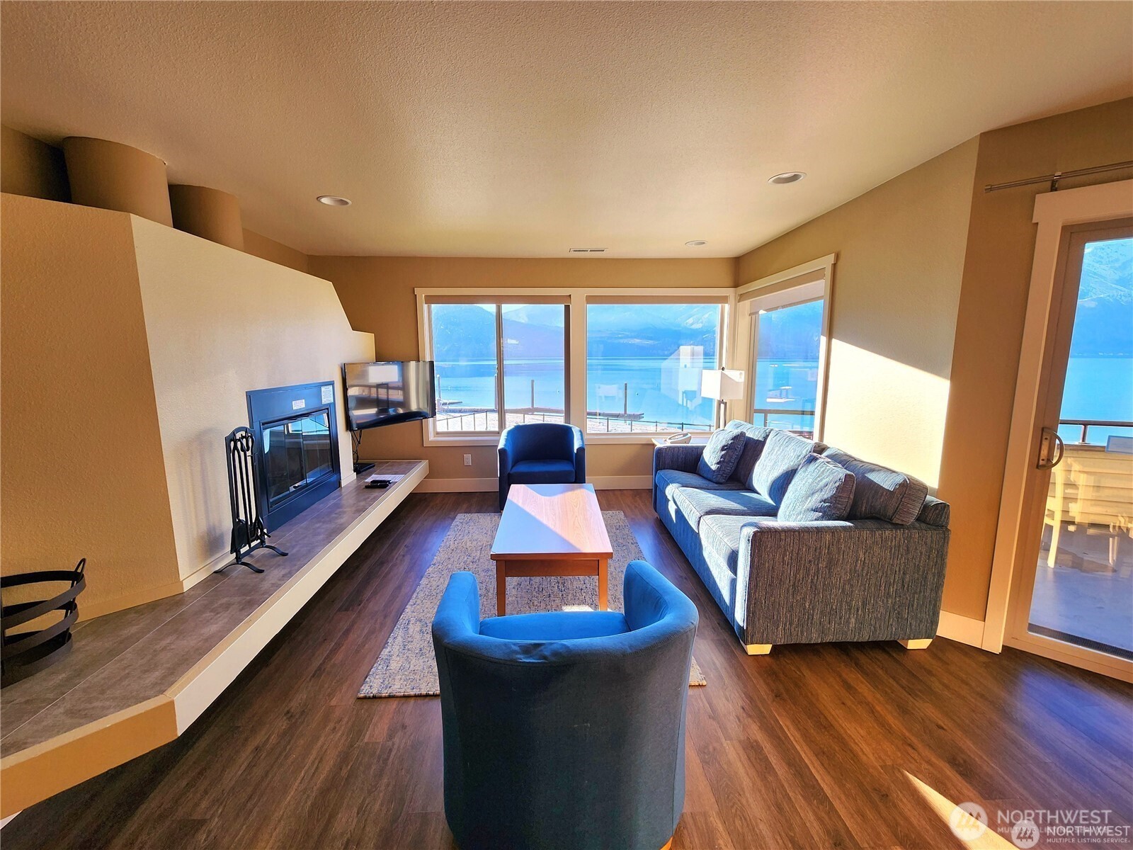 1 Lakeside 708-l Manson, WA 98831 - Photo 7 of 36 a living room with furniture and a flat screen tv