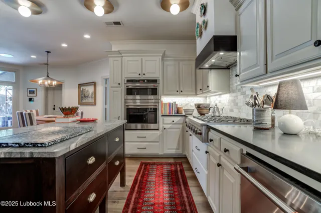 a living room with furniture a window and a fireplace