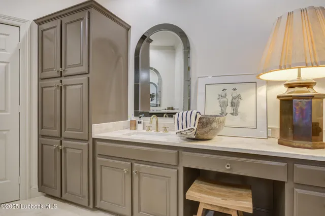 a utility room with sink dryer and washer