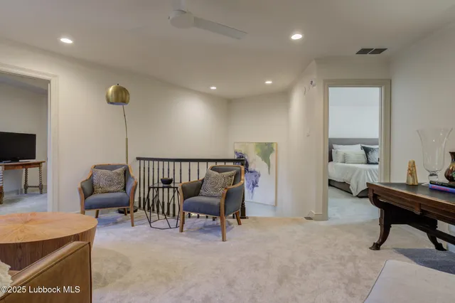 a bathroom with a bathtub and a sink