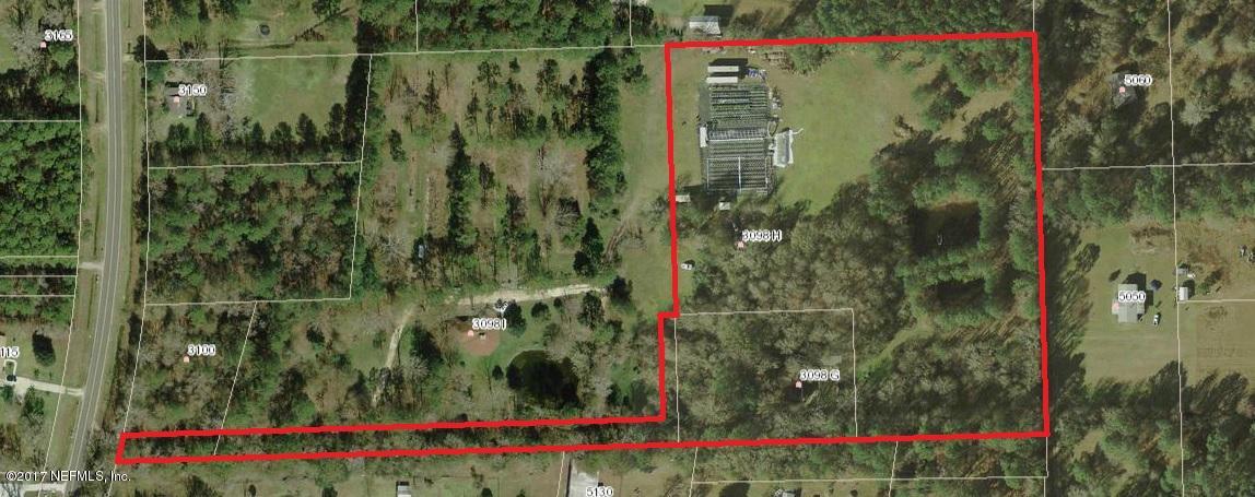3098 Pacetti Road, Unit G St. Augustine, FL 32092 - Photo 16 of 17 a view of a wooden bridge