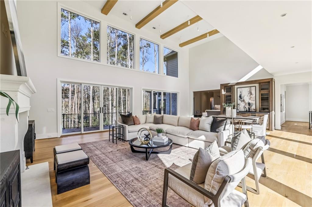 825 Kenry Court Atlanta, GA 30342 - Photo 11 of 49 a living room with furniture and a large window
