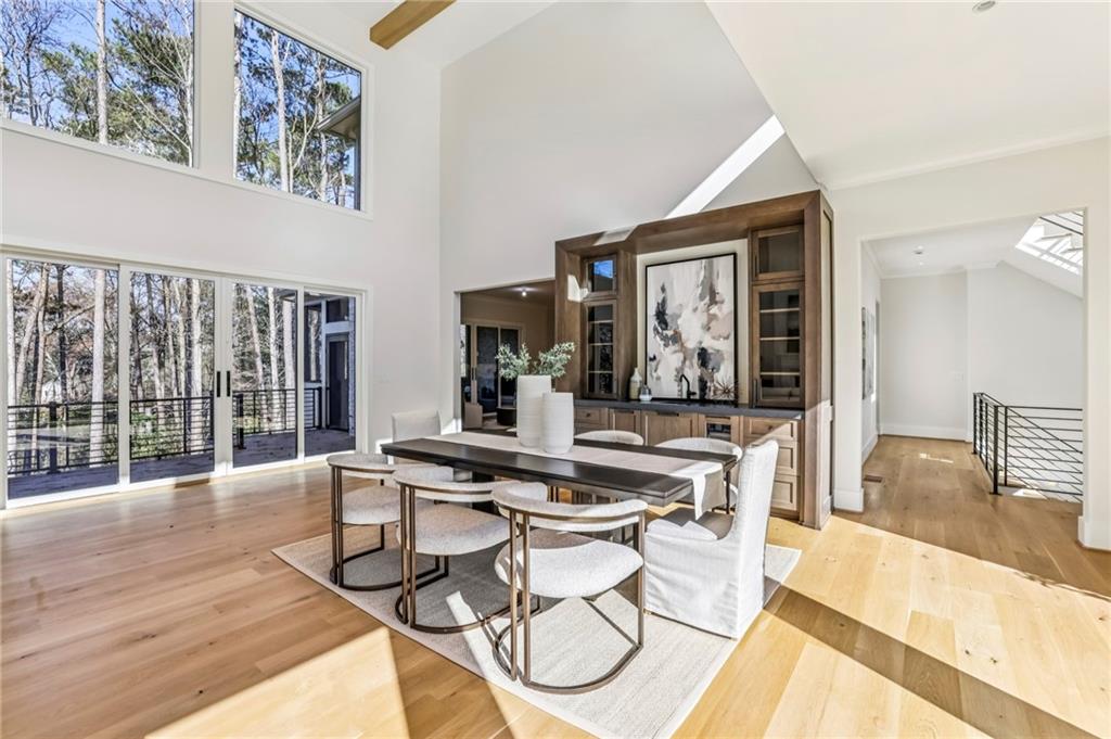 825 Kenry Court Atlanta, GA 30342 - Photo 12 of 49 a work place with glass table and chairs