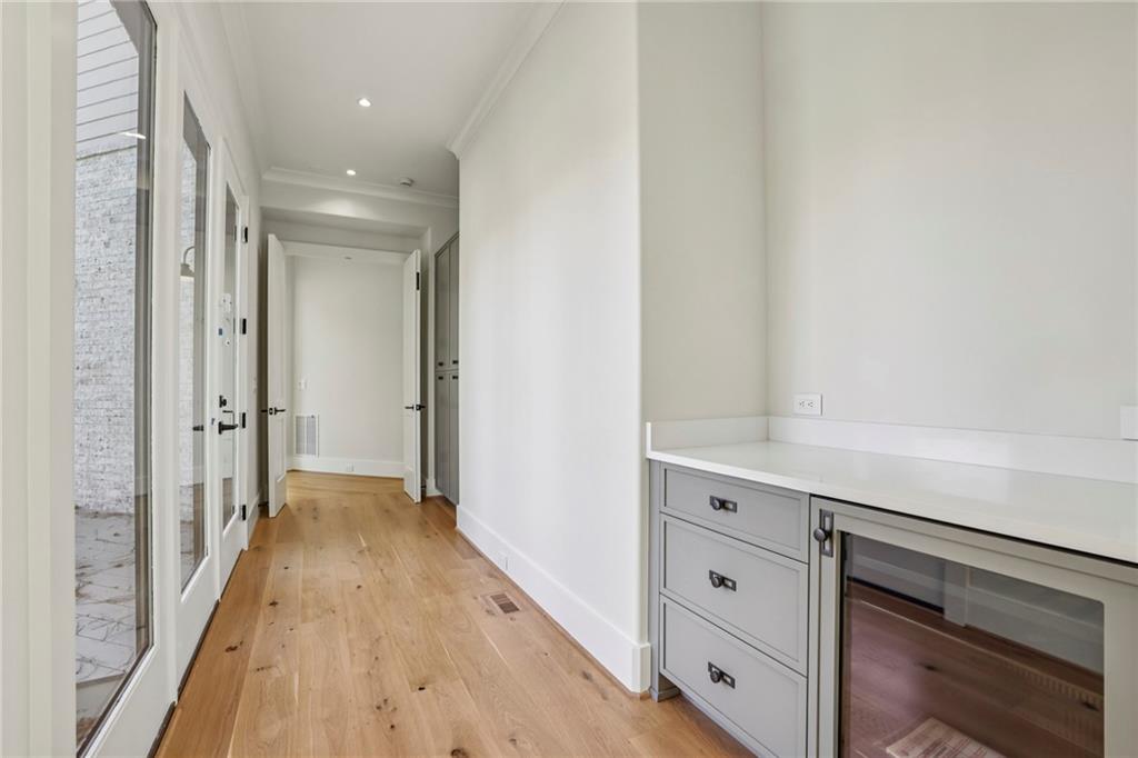825 Kenry Court Atlanta, GA 30342 - Photo 20 of 49 a view of a hallway with wooden floor