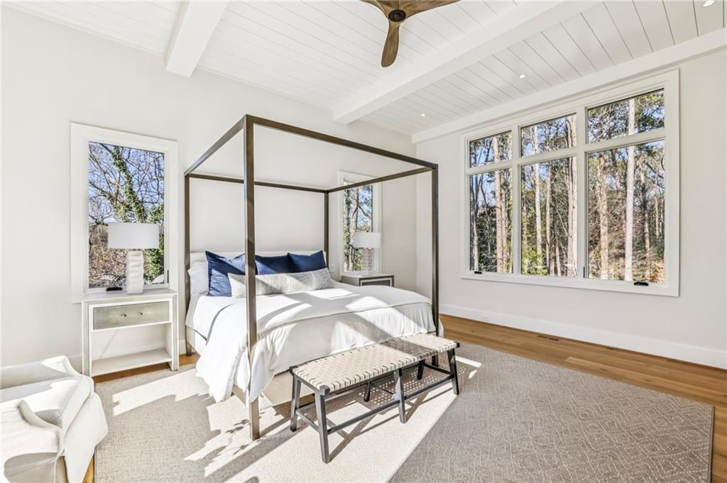 825 Kenry Court Atlanta, GA 30342 - Photo 22 of 49 a bedroom with furniture and a window