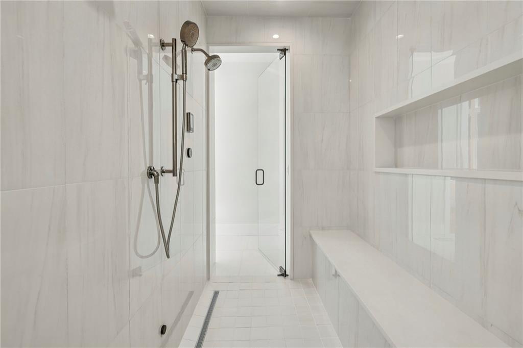 825 Kenry Court Atlanta, GA 30342 - Photo 26 of 49 a bathroom with a shower and a shower