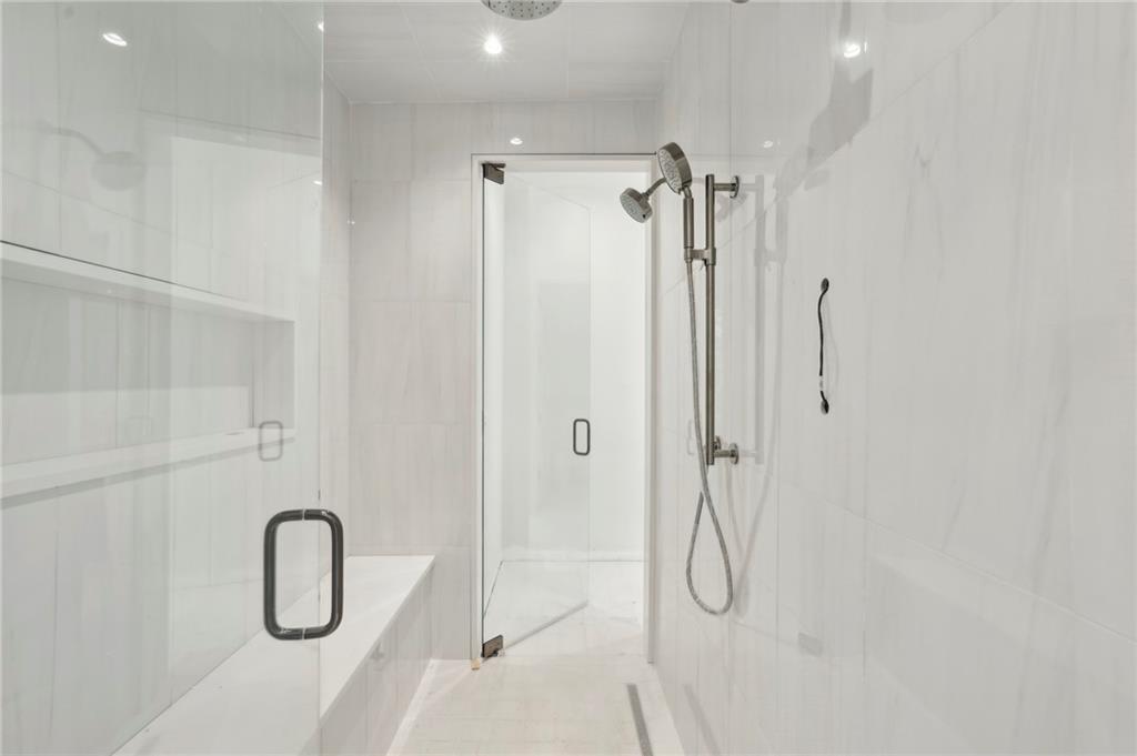 825 Kenry Court Atlanta, GA 30342 - Photo 27 of 49 a bathroom with a shower