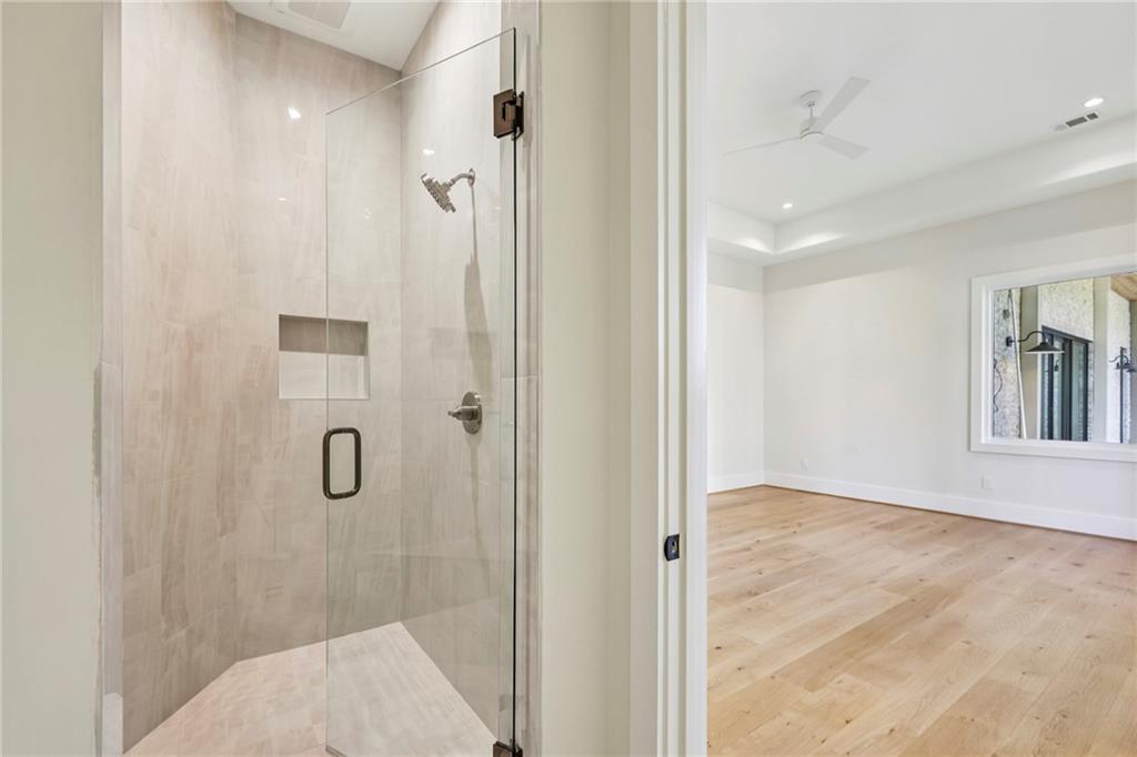 825 Kenry Court Atlanta, GA 30342 - Photo 37 of 49 a bathroom with a shower