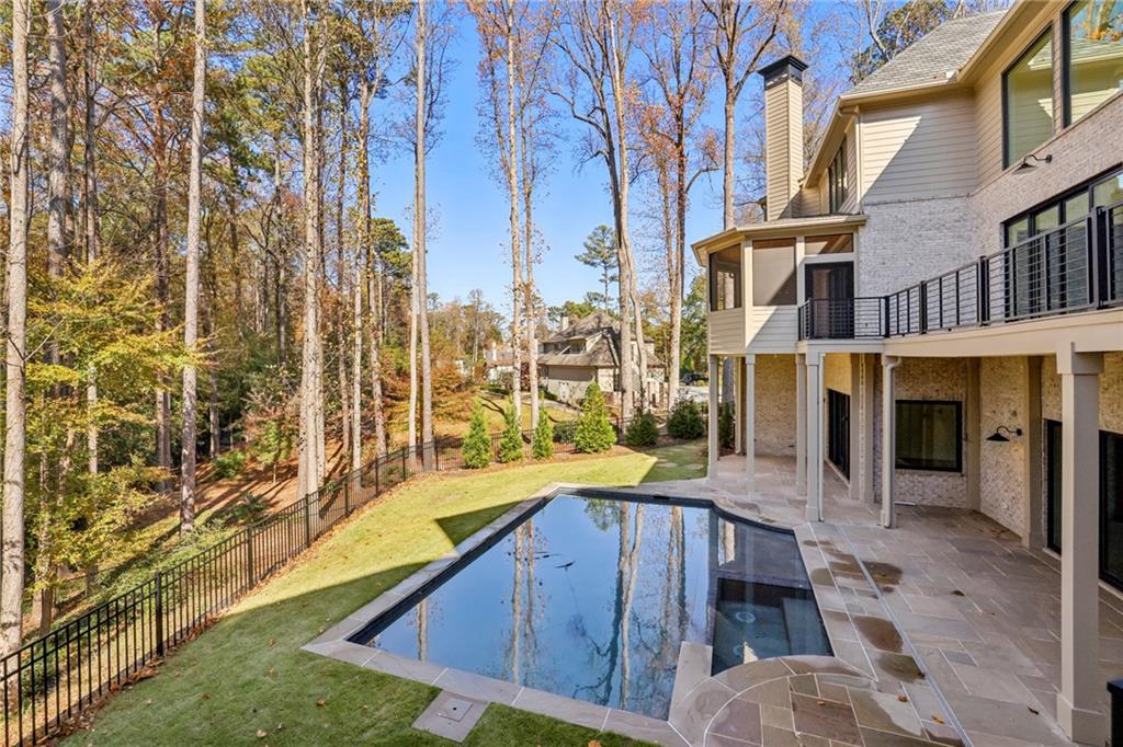 825 Kenry Court Atlanta, GA 30342 - Photo 48 of 49 a view of an outdoor space with swimming pool