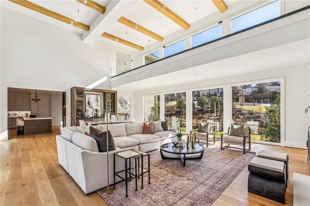 825 Kenry Court Atlanta, GA 30342 - Photo 6 of 49 a living room with furniture and a large window