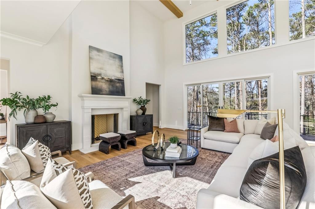 825 Kenry Court Atlanta, GA 30342 - Photo 7 of 49 a living room with furniture fireplace and potted plant
