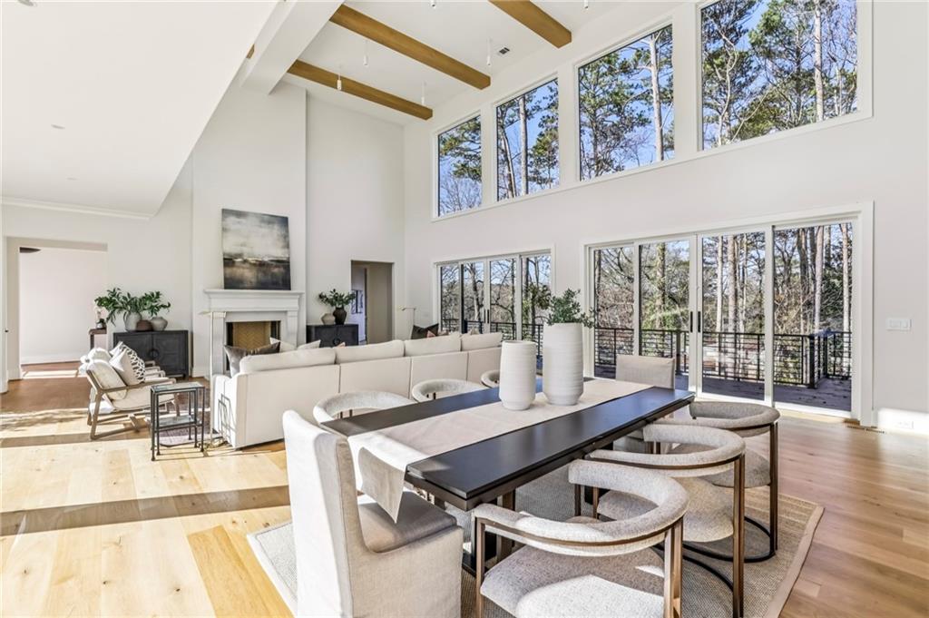 825 Kenry Court Atlanta, GA 30342 - Photo 10 of 49 a living room with fireplace furniture and a table