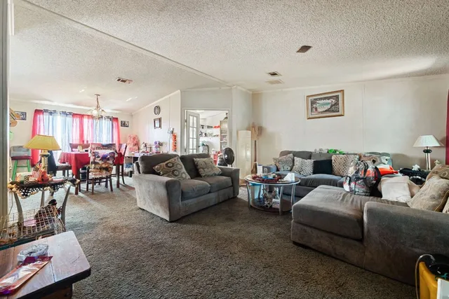 a living room with furniture and a view of living room