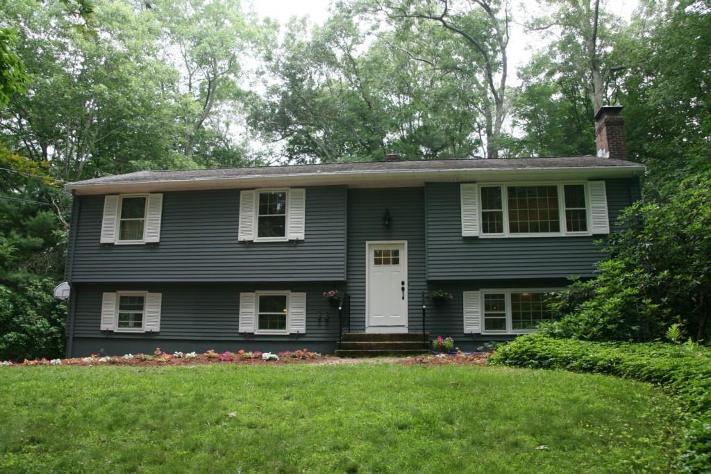 48 Ellise Road Mansfield, CT 06268 - Photo 1 of 1 a front view of a house with a garden