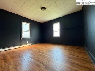 an empty room with windows