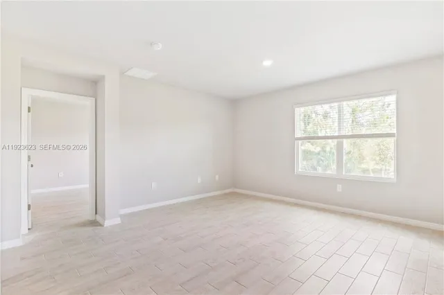 an empty room with windows