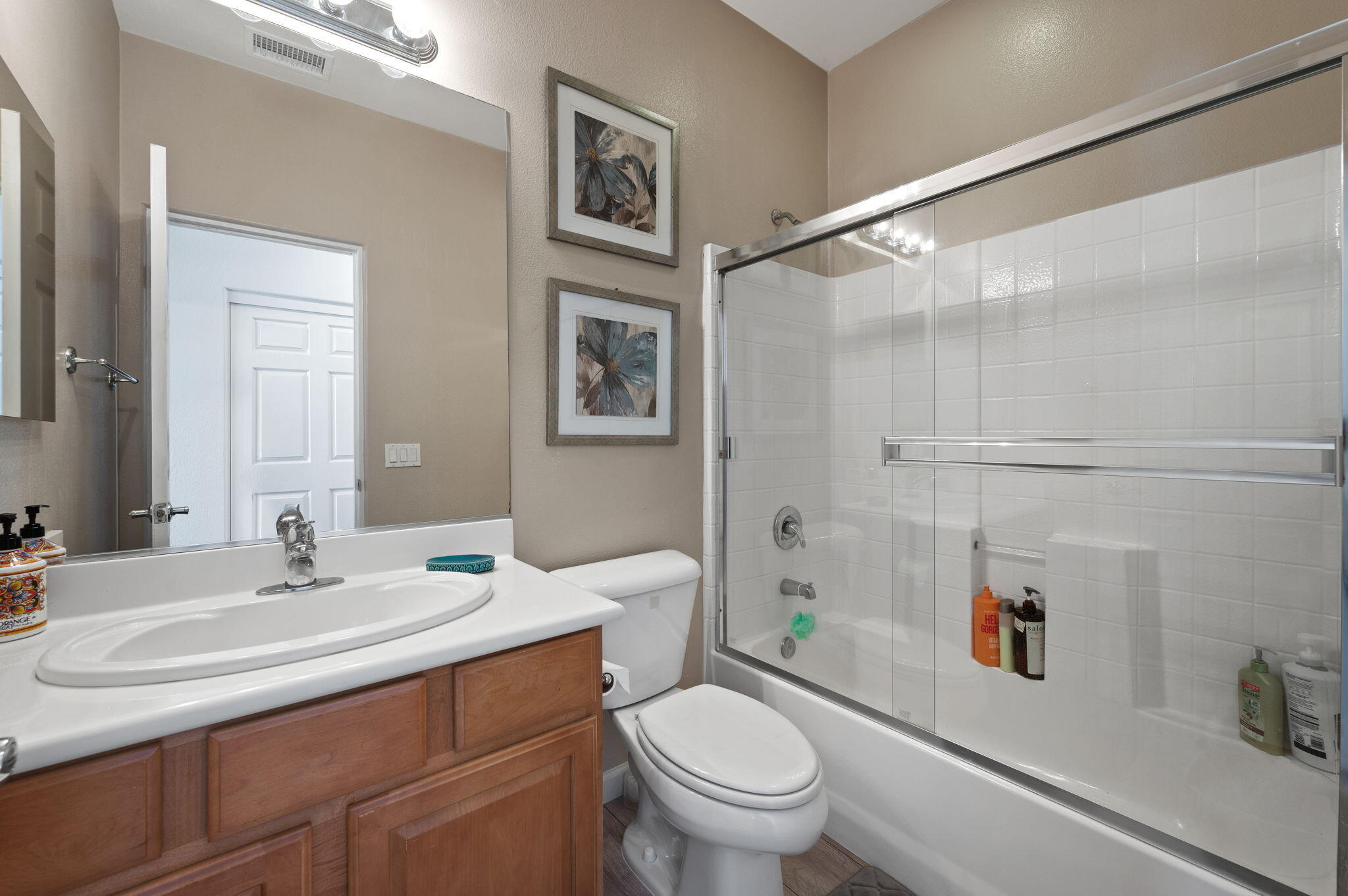 83035 Exeter Court Thermal, CA 92274 - Photo 18 of 38 a bathroom with a sink toilet and shower