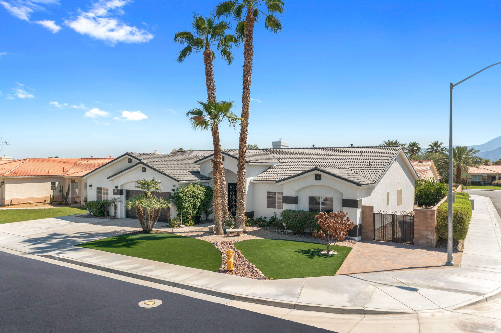 83035 Exeter Court Thermal, CA 92274 - Photo 2 of 38 a front view of a house with garden